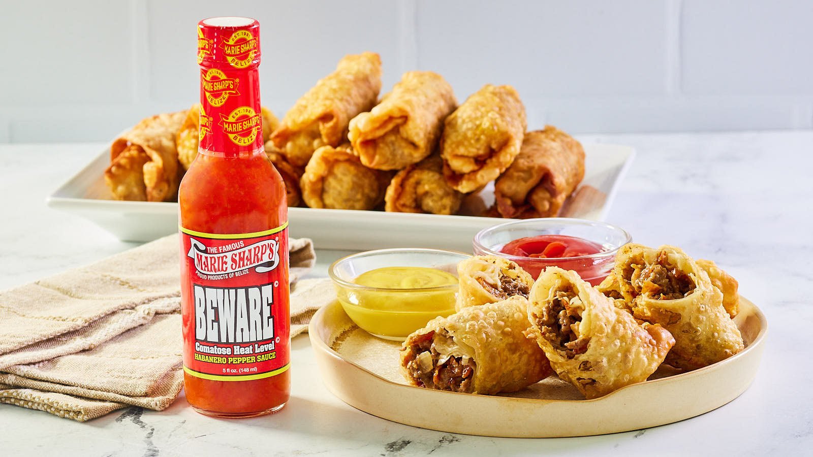 Cheeseburger Egg Rolls with Marie Sharp’s Beware Comatose Level Habanero Pepper Sauce - Pepperheadz Company Store