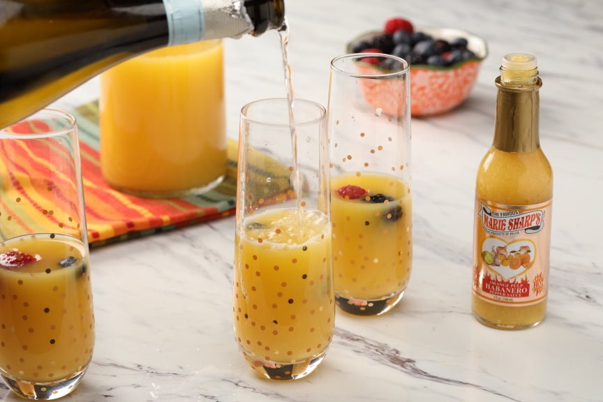 Mimosa Recipe to Warm Your Heart and Your Tastebuds with Marie Sharp's Orange Pulp Habanero Sauce - Pepperheadz Company Store